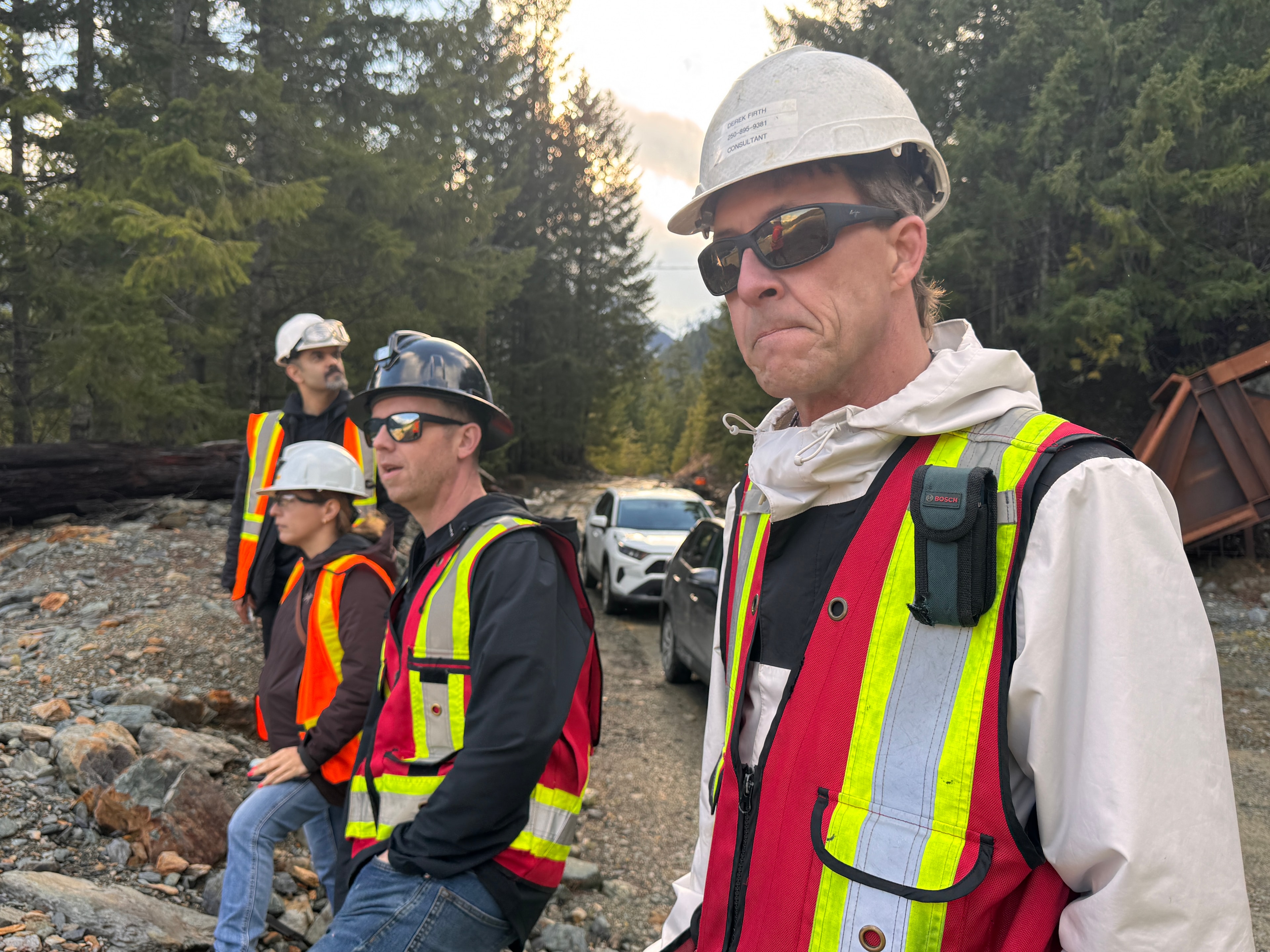 Paige Foster and Derek Firth of Resolve Quantum in safety vests and hard hats on a remote site